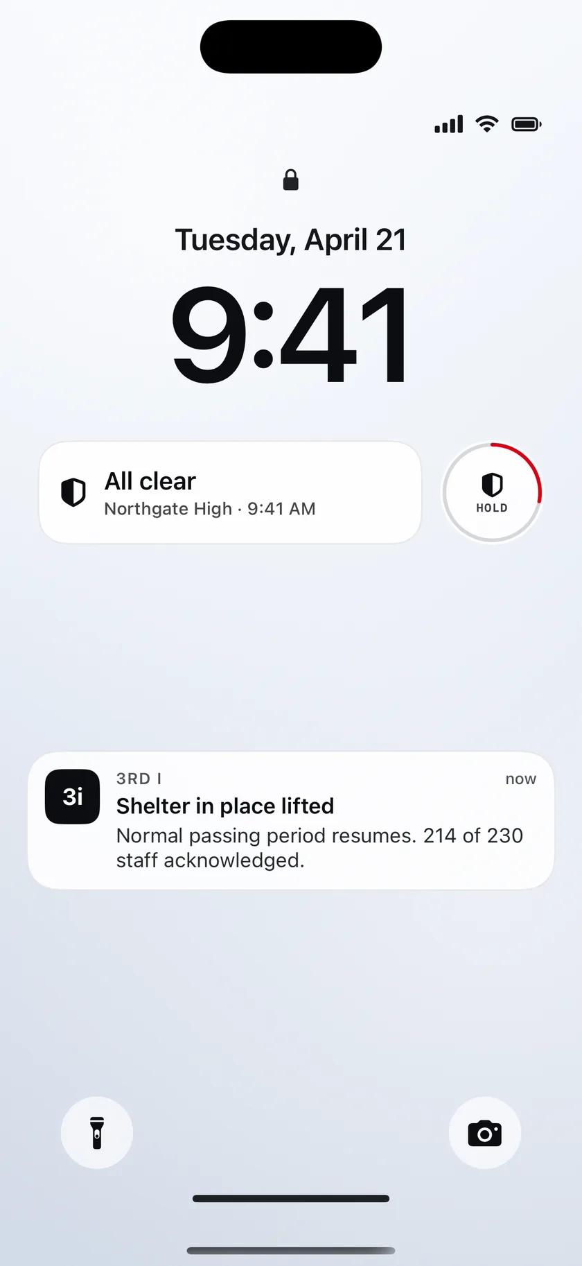 A lock screen with the campus status widget and a shelter-in-place-lifted notification
